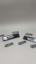 EXC STICKER AND JETTAG PACK